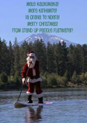 SUP Christmas Card Featuring Santa Claus Stand Up Paddling on the Deschutes River in Bend, Oregon.